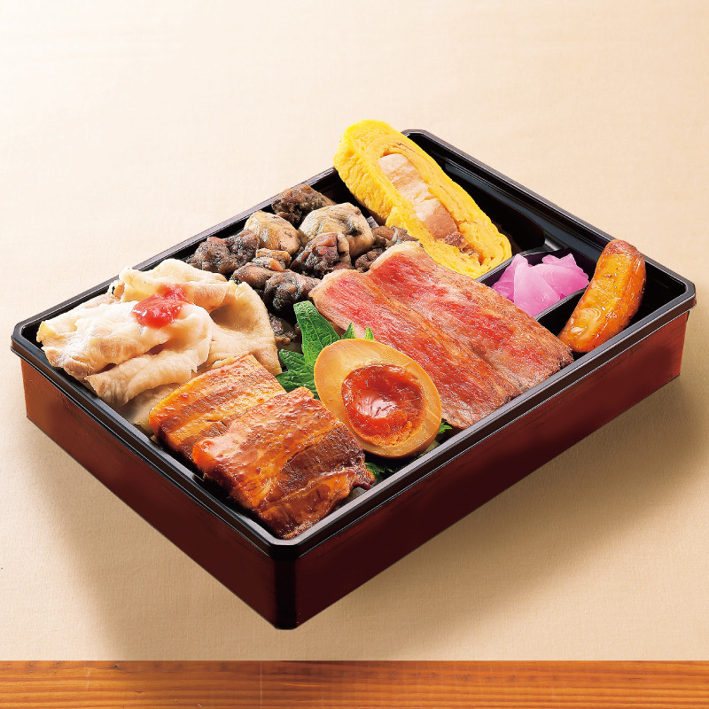 ［Dining萬來］
四種の彩り肉づくし弁当